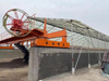 The disc type hydraulic lifting and flipping machine